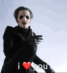 a man in a ghost costume is holding a gun and saying i love you