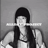 a black and white photo of a woman with the words allday project written above her