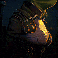 a close up of a woman 's breasts with a purple jacket