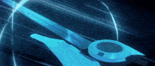 a futuristic scissors with a blue light behind it