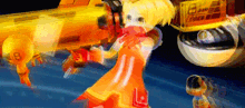 a girl in an orange dress is holding a gun with a lb on it