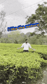 a man standing in a field with the words i like the nature