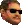 a close up of a man 's head wearing sunglasses .