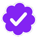 a purple flower with a white check mark inside of it