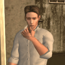 a man in a white shirt is standing in front of a wall
