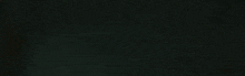 a close up of a black background with a few lines on it .