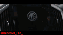 a man in a blue jacket is sitting in a car with the name benedict_fan_ on the bottom