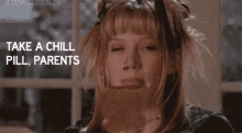 a girl says take a chill pill parents while eating a sandwich