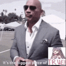 a bald man in a suit and sunglasses is standing in front of a white tent .