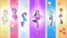 a group of ponies are standing next to each other