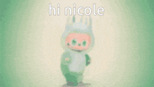 a blurred image of a stuffed animal wearing a red bunny costume with the words hi nicole written above it .