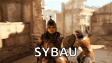 a man in armor is fighting another man in a video game with the word sybau written on the screen .