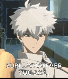 a man with white hair is standing in a room and saying `` sure ... whatever you say ... ''