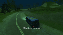 a sprite van is driving down a road at night with a dialling number displayed on the back