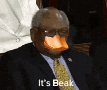 a man in a suit and tie with a duck mask on his face and the words it 's beak below him
