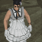 a man wearing a white dress with ruffles and a black bow tie