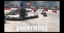 a video of people playing go karts with the words anonymous below them