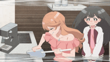 a girl in a pink top is holding a spatula