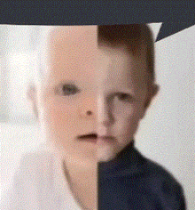 a close up of a baby 's face with half of it white and half black