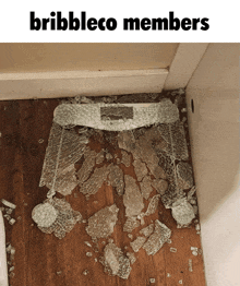 a picture of a broken glass scale with the words bribbleco members above it