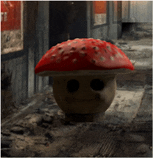 a statue of a mushroom with a sad face on it