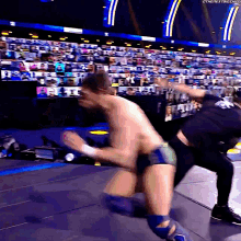 Daniel Bryan Running Knee GIF - Daniel Bryan Running Knee Roman Reigns GIFs