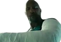 a man with a cast on his arm looks to his left
