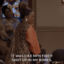 a woman is dancing in a church and says `` it was like mfn fire !!! shut up in my bones . ''