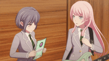two anime girls are standing next to each other and one is holding a piece of paper that says ' friendship '