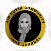 a black and white photo of a woman in a hijab with the words air putih community