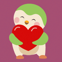 a penguin is holding a red heart in its arms