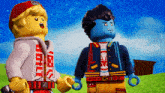two lego figures are standing next to each other with one wearing a jacket with the letter m on the front
