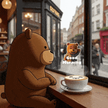 a teddy bear sits on a window sill next to a cup of coffee and says good morning