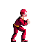 a pixel art of a man in a red suit is squatting down .