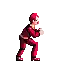 a pixel art of a man in a red suit is squatting down .