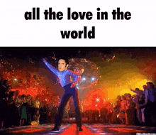 a man is dancing in front of a disco ball with the words all the love in the world below him