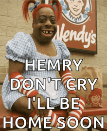 henry don t cry i 'll be home soon written on a sign