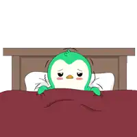a green and white penguin is laying in bed with a red blanket