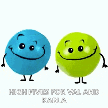 a blue and green ball with faces on them are giving each other high fives .