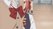 a close up of a girl with red hair and a bow tie