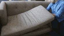 Finding Loose Change Under The Couch Cushion GIF - Couch Coins Loose Change GIFs