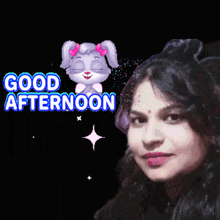 a woman is smiling in front of a good afternoon message
