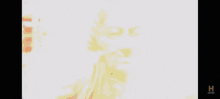a blurry picture of a statue of george washington with the letter h below it