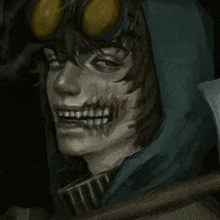 a close up of a person wearing a hooded jacket and goggles with a skull on their face .