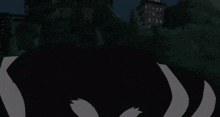 a cartoon drawing of a monster with a big smile on its face .