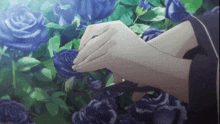 a person is holding a blue rose in their hand