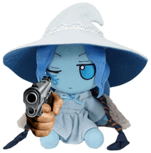 a stuffed witch with blue hair and a white hat is pointing a gun