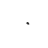 a small black object is flying in the sky on a white background .