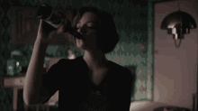 The Queens Gambit Tv Show Anya Taylor Joy GIF - The Queens Gambit Tv Show Anya Taylor Joy Drinking A Bottle Of Alcohol GIFs