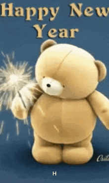 a teddy bear is holding a sparkler and says happy new year on the bottom
